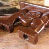 Pair of Art Deco carved wood candlesticks, signed Delaporte