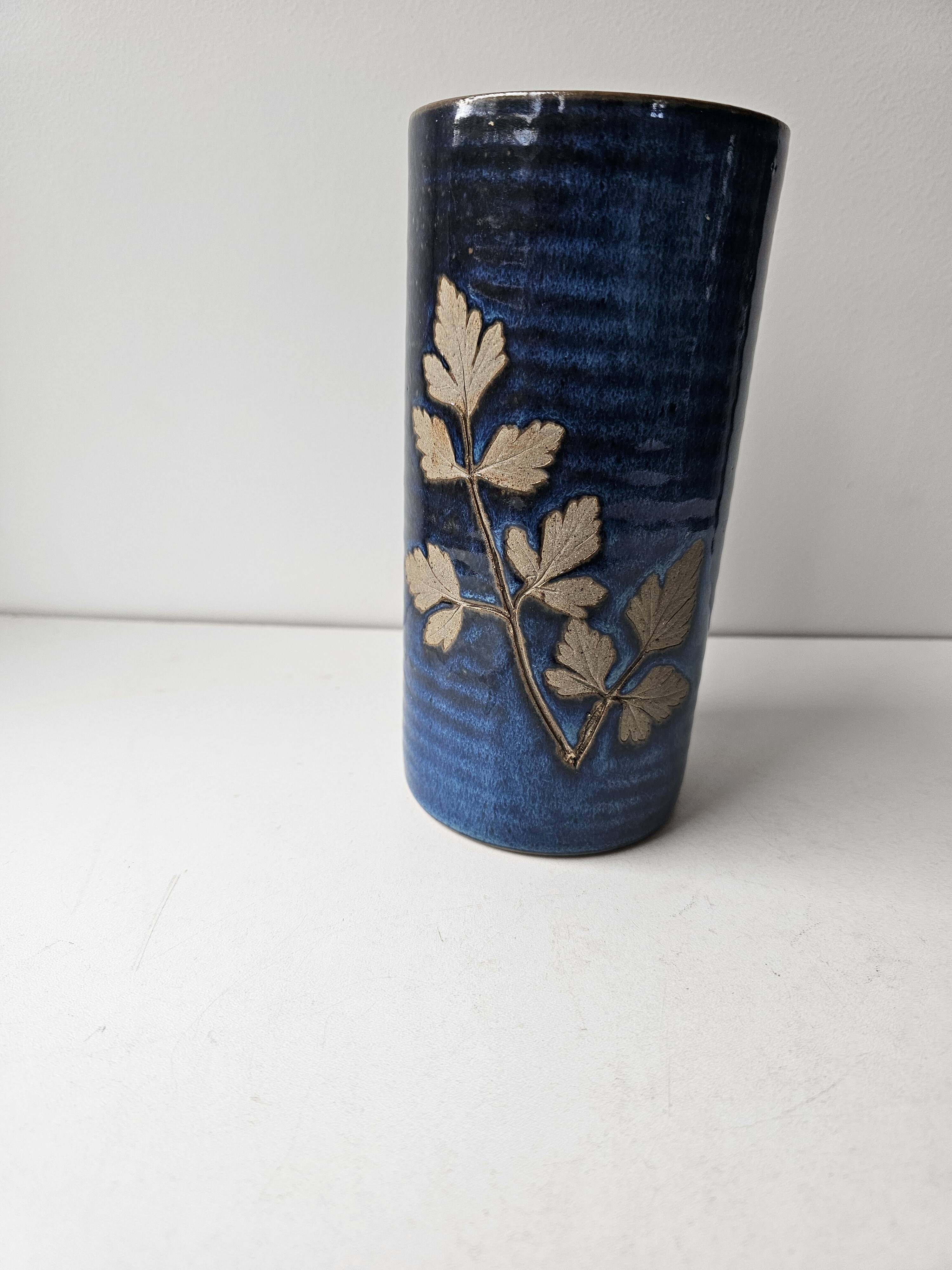Blue ceramic vase with roller signed AB (signature to be identified)