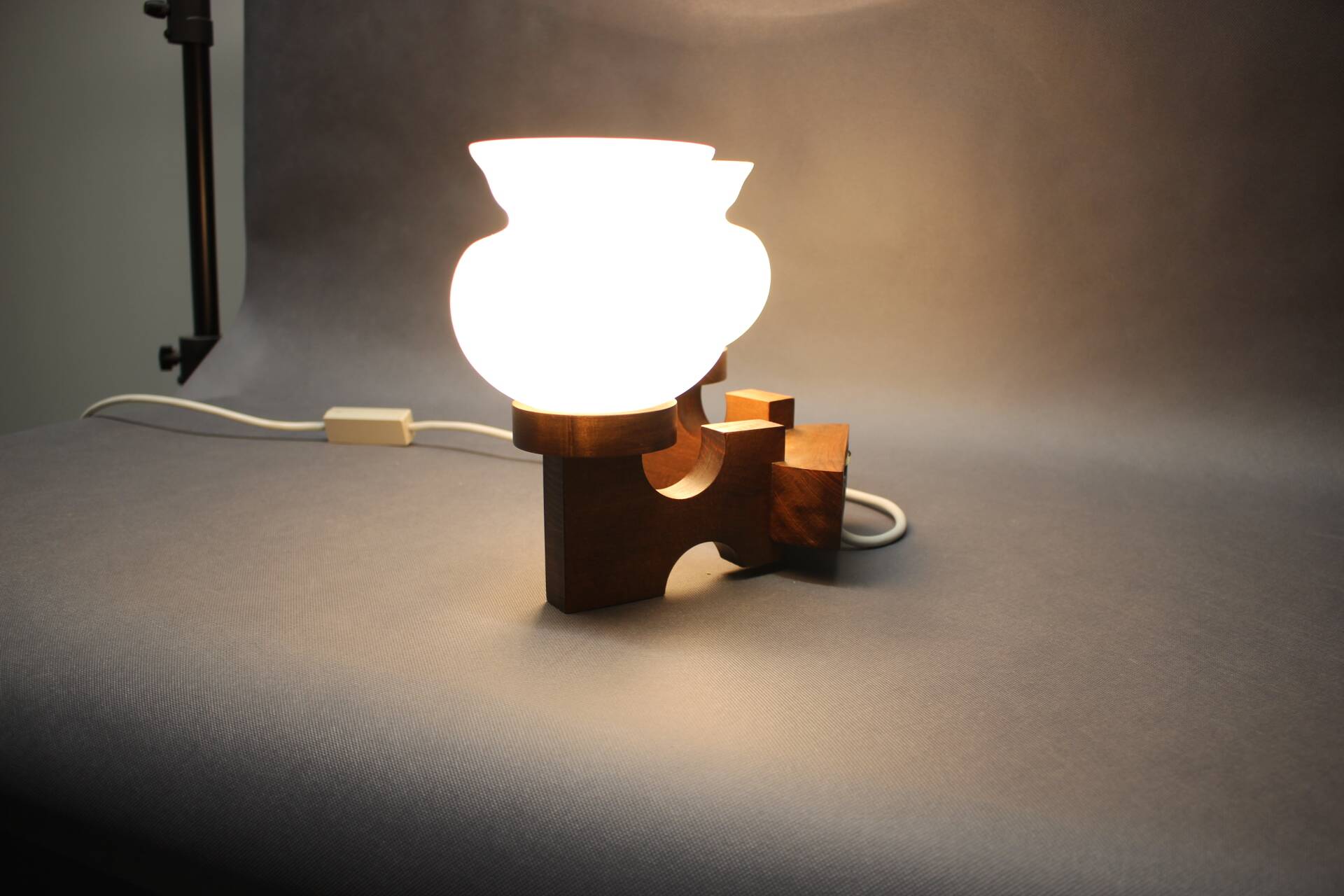 Czechoslovak wall lamp from the 1960s with Valasske Mezirici glass and a wooden base.