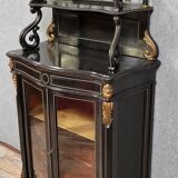 Curved "Boulle" display case from the Napoleon III period in blackened and gilded wood