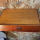 Suspended teak bedside tables in vintage 1960s Scandinavian style.