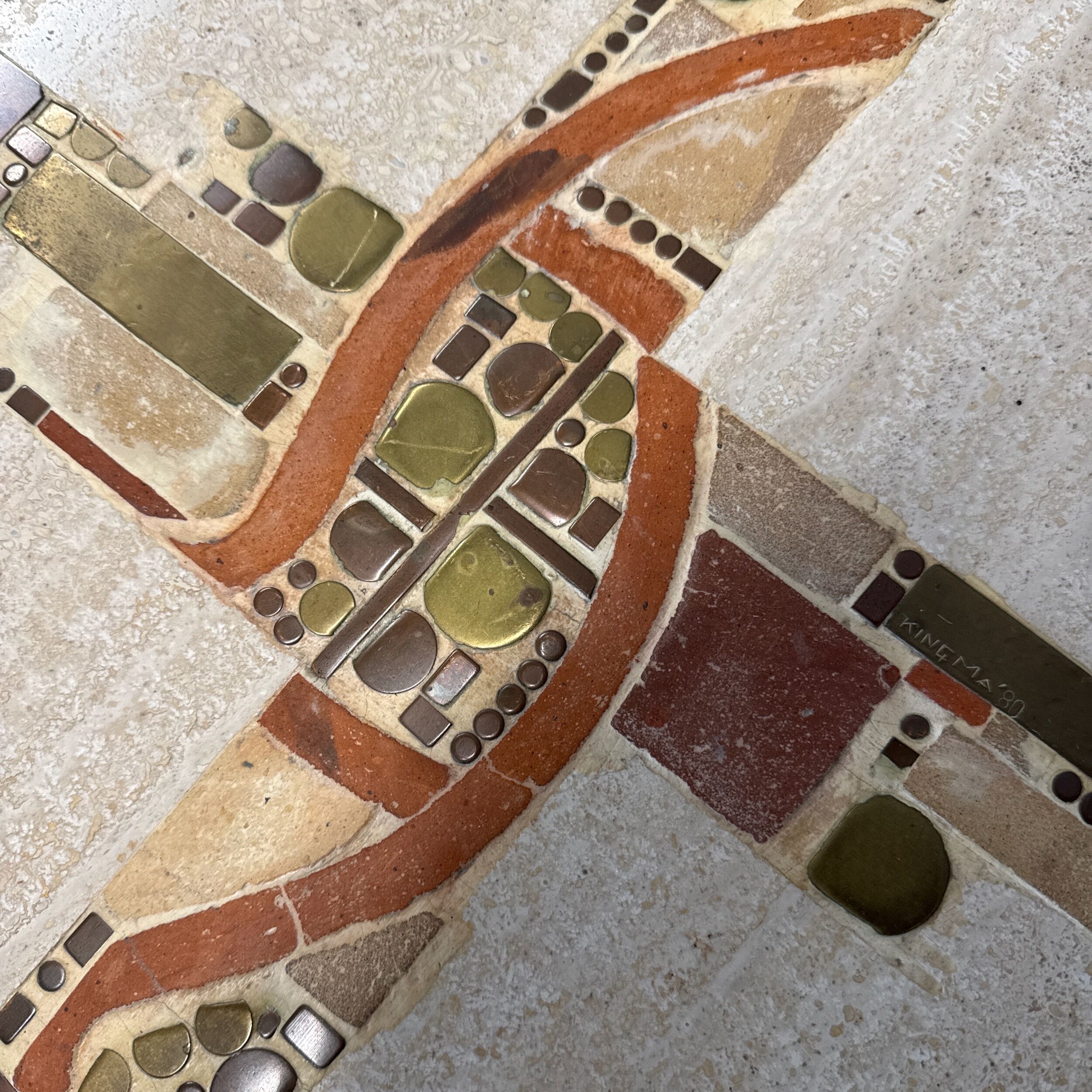 Coffee table by Paul Kingma in travertine with marble and brass inlay, 1980
