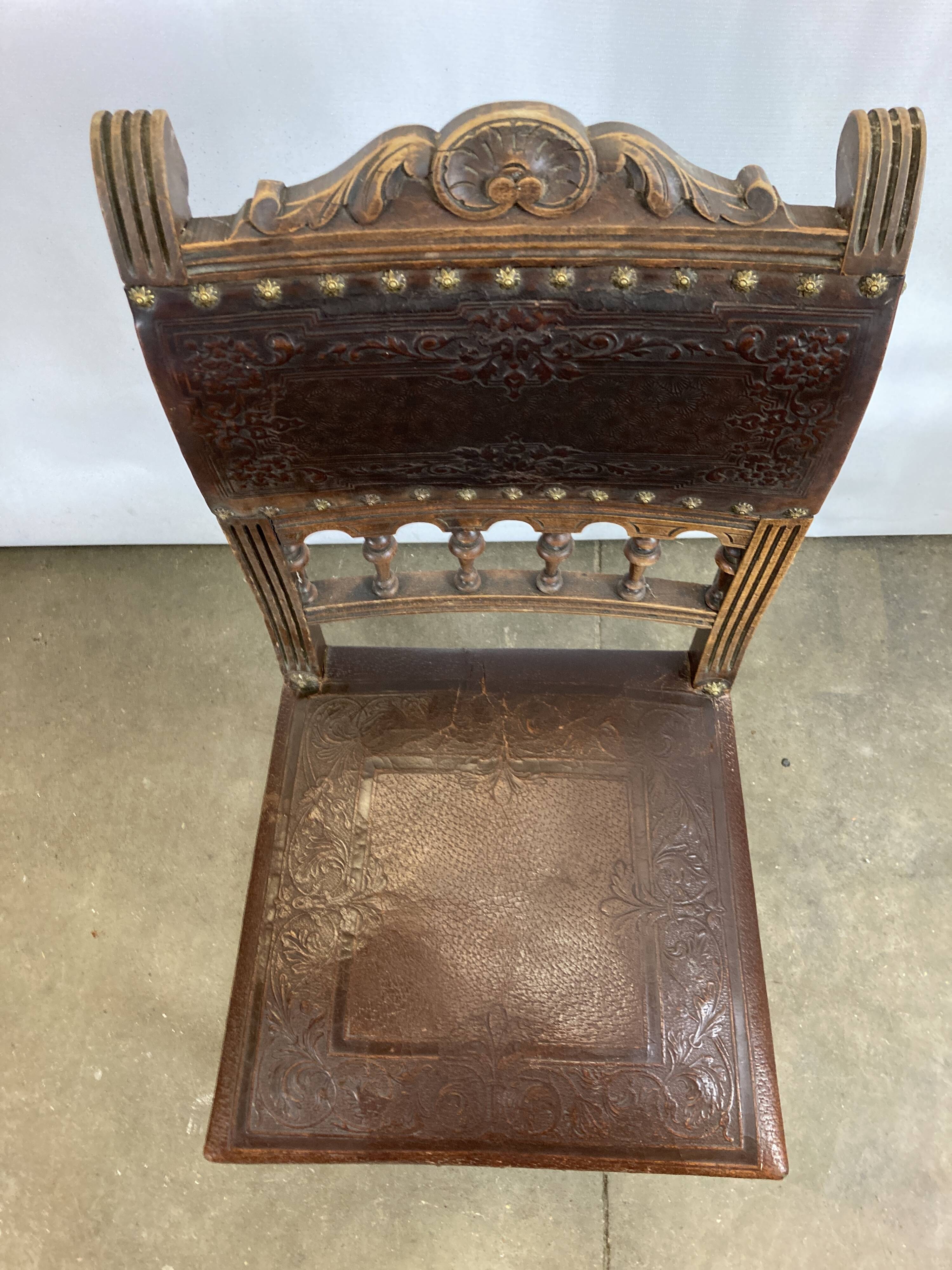 Pair of Henry II wooden and leather chairs