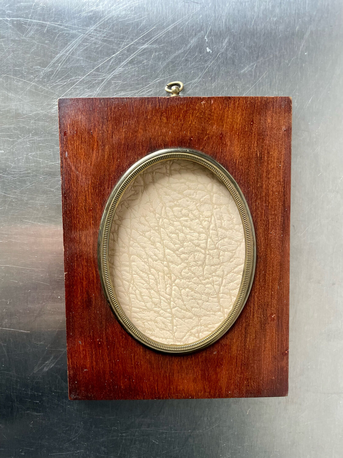 Mahogany wood frame with brass borders