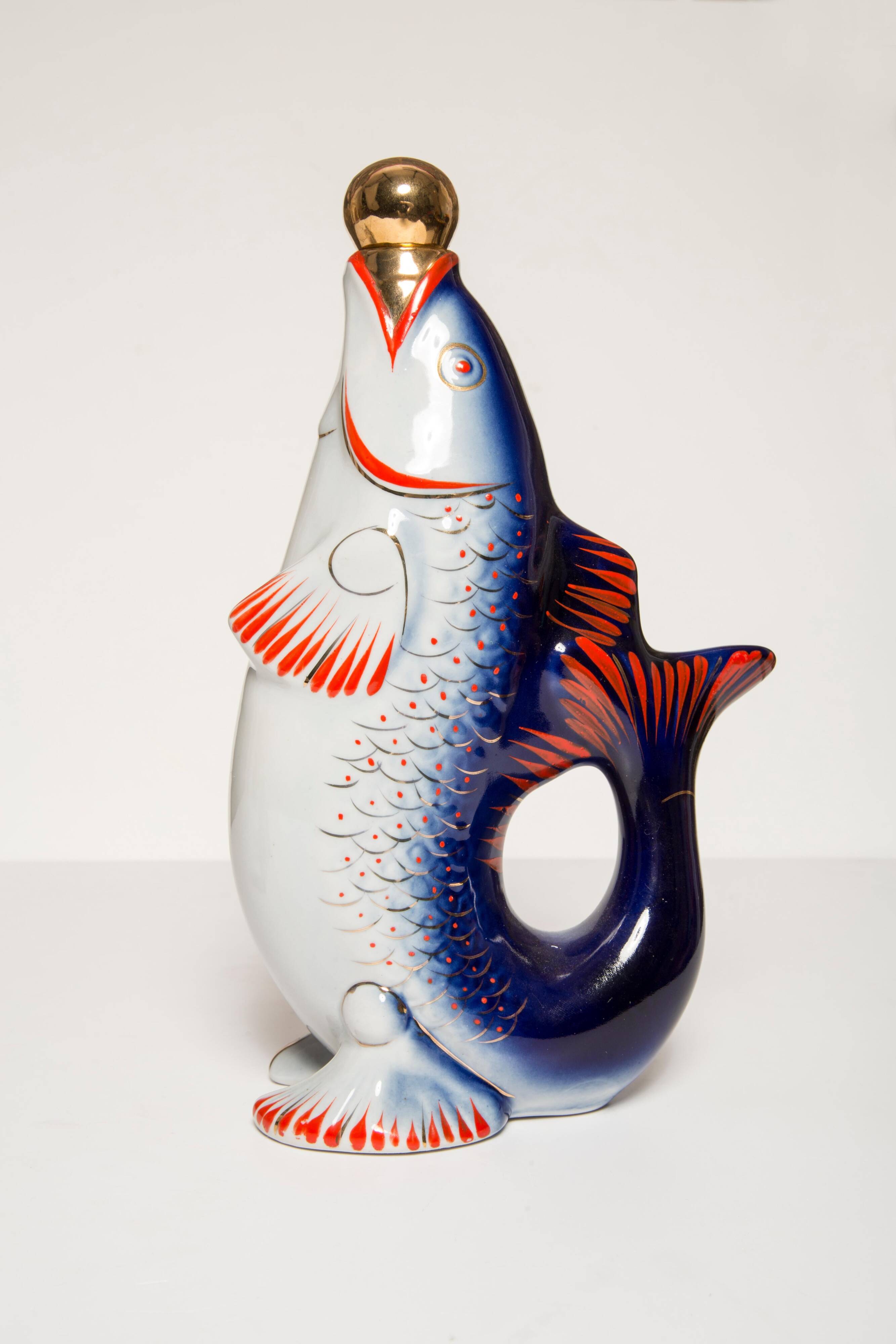 Set of 7 glasses and a glass carafe decorated with blue fish, Mid-Century Modern style, Europe, 1960s.