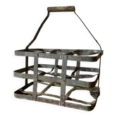 Ancien porte-bouteilles en zinc torsadé