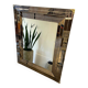 Vintage gold wall mirror with a smoked mirror border.