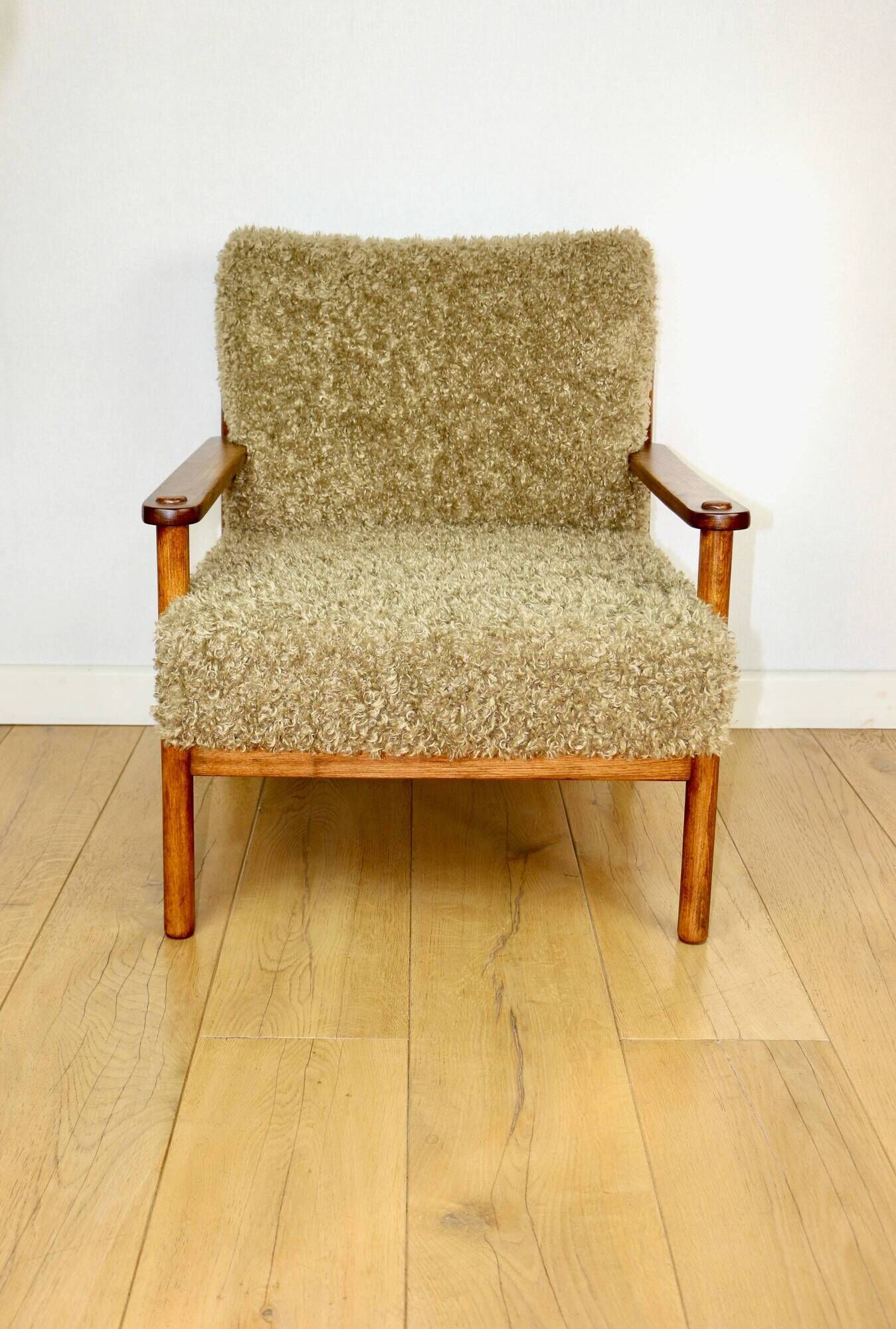 Wooden vintage brown armchair, olive green, long pile on removable cushions