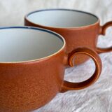 2 very and earthenware coffee cups