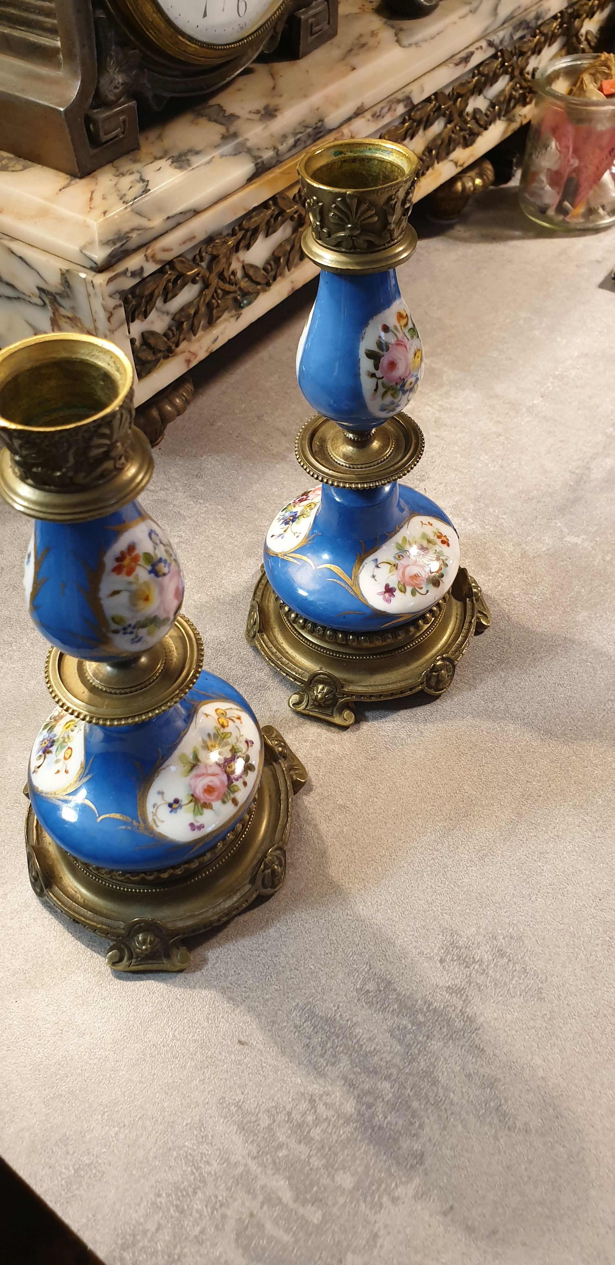 Pair of xixth candle holders, in bronze and enamelled porcelain