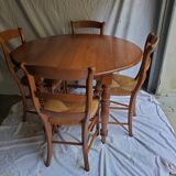 Round table, Louis Philippe style, antique patina, its 2 extensions and 4 chairs