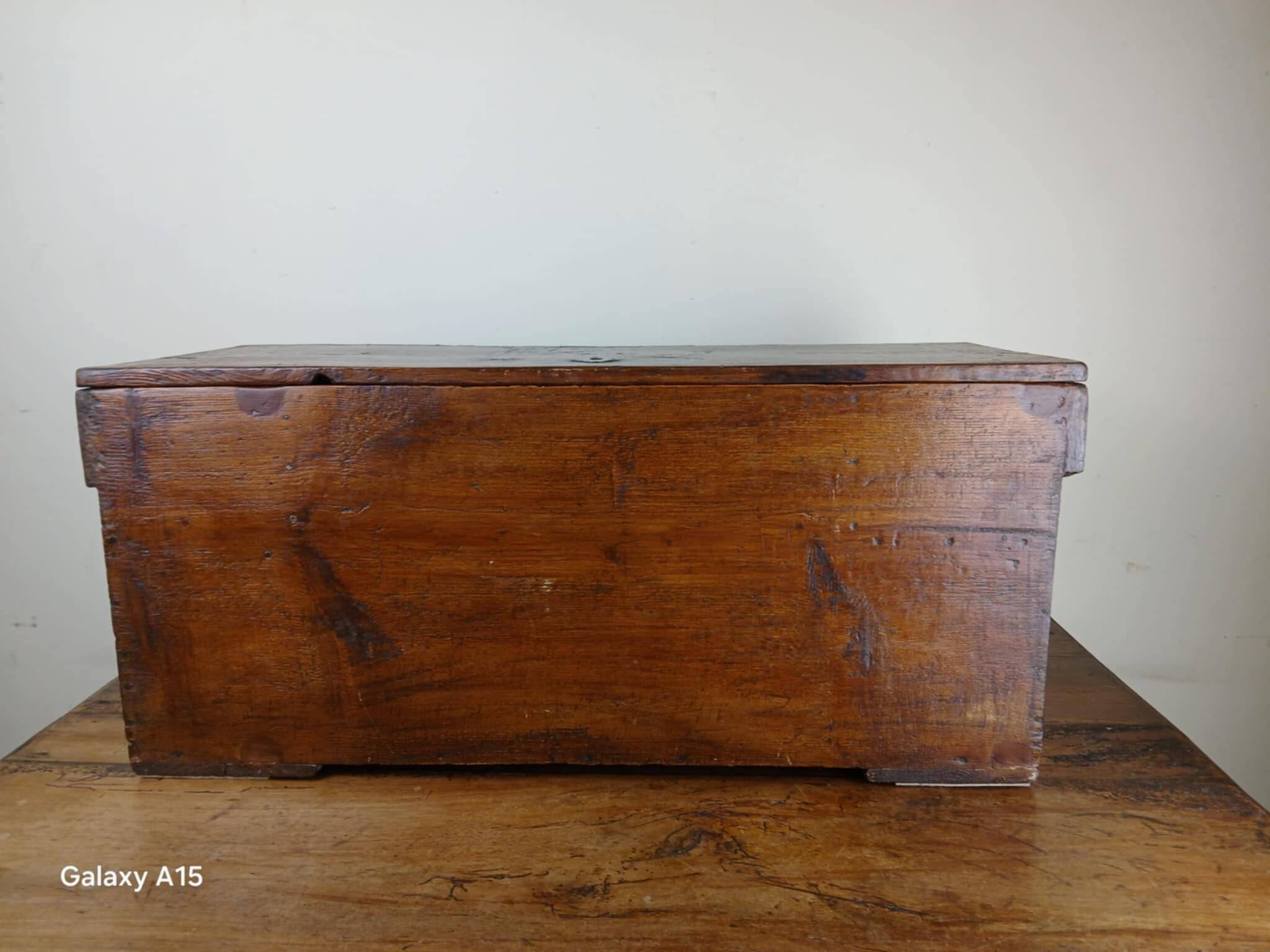 Old solid wood transport chest from the early 19th century