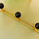 Wall-mounted ball coat rack