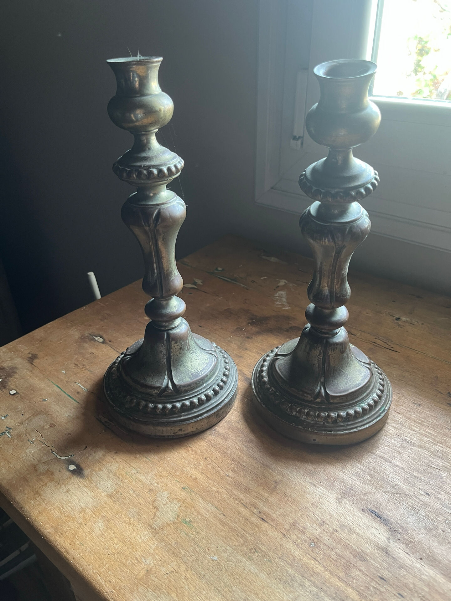2 antique silver candlesticks