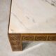 Table basse bois sculpté et marbre
