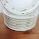 Set of 9 flat plates in Limoges porcelain, white and gold