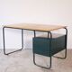 Desk with bauhaus style tubular steel chair
