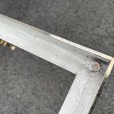 Coffee table in gilded brass and veined green marble