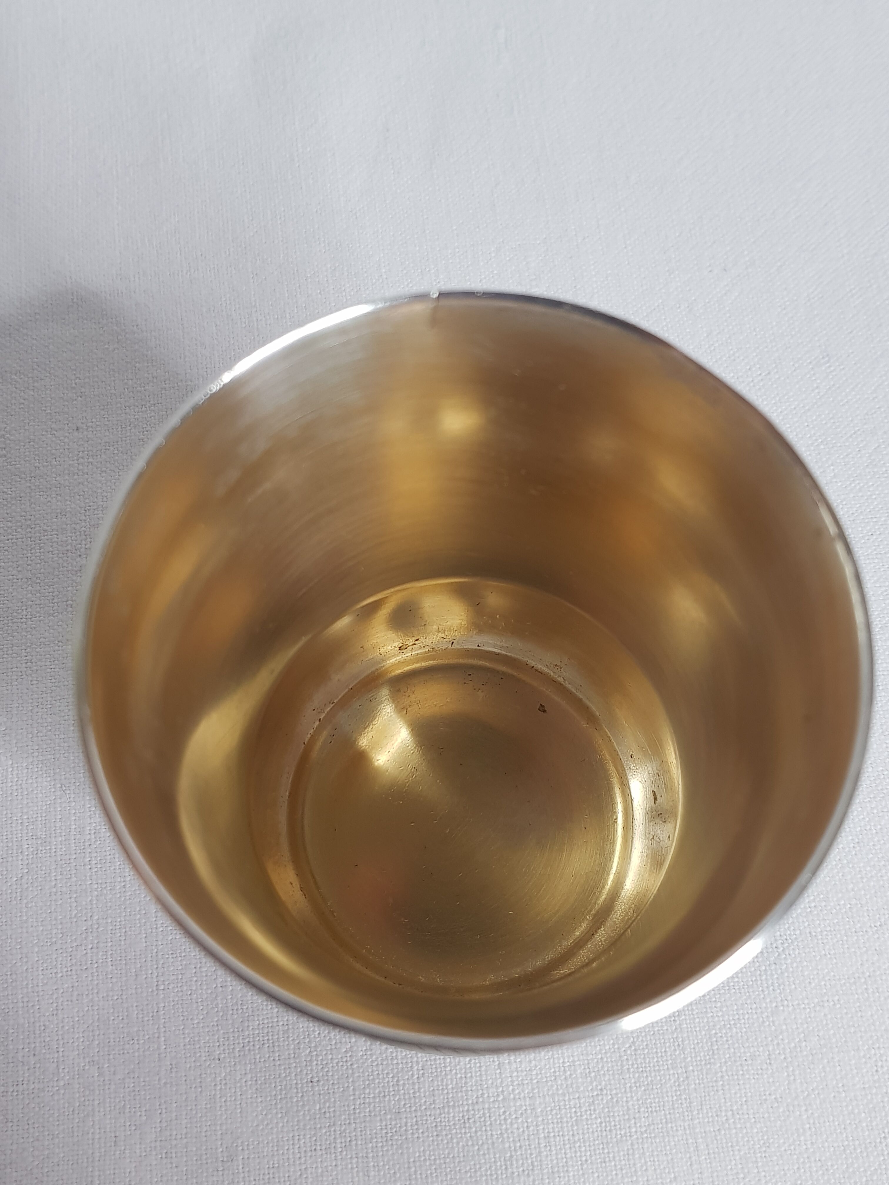 Old silver metal timbale with punch