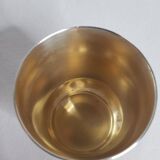 Old silver metal timbale with punch