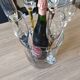 Crystal champagne flutes in their bucket