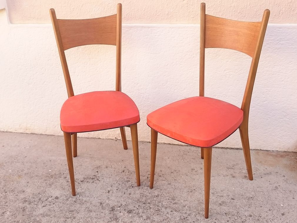 Two red vintage chairs