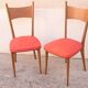 Two red vintage chairs
