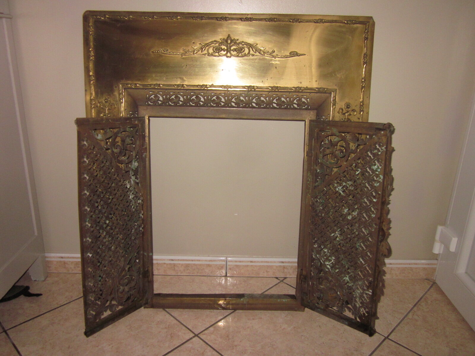Antique brass fireplace front