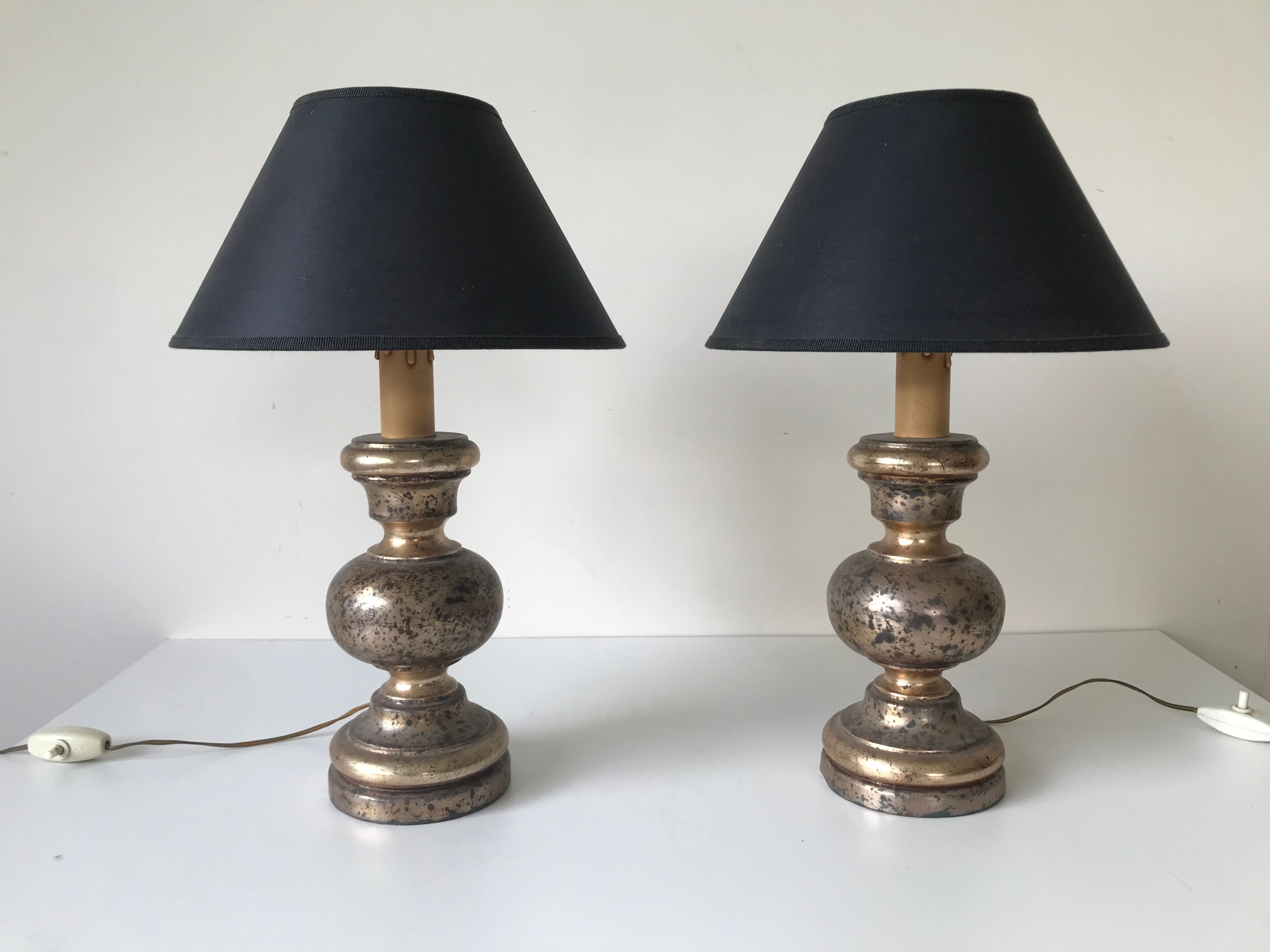 Paire de lampes florentines en bois doré, vers 1950.
