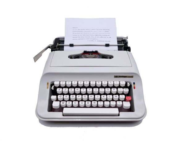 Machine à écrire Olivetti Scheidegger président bordeaux et blanche révisée ruban neuf