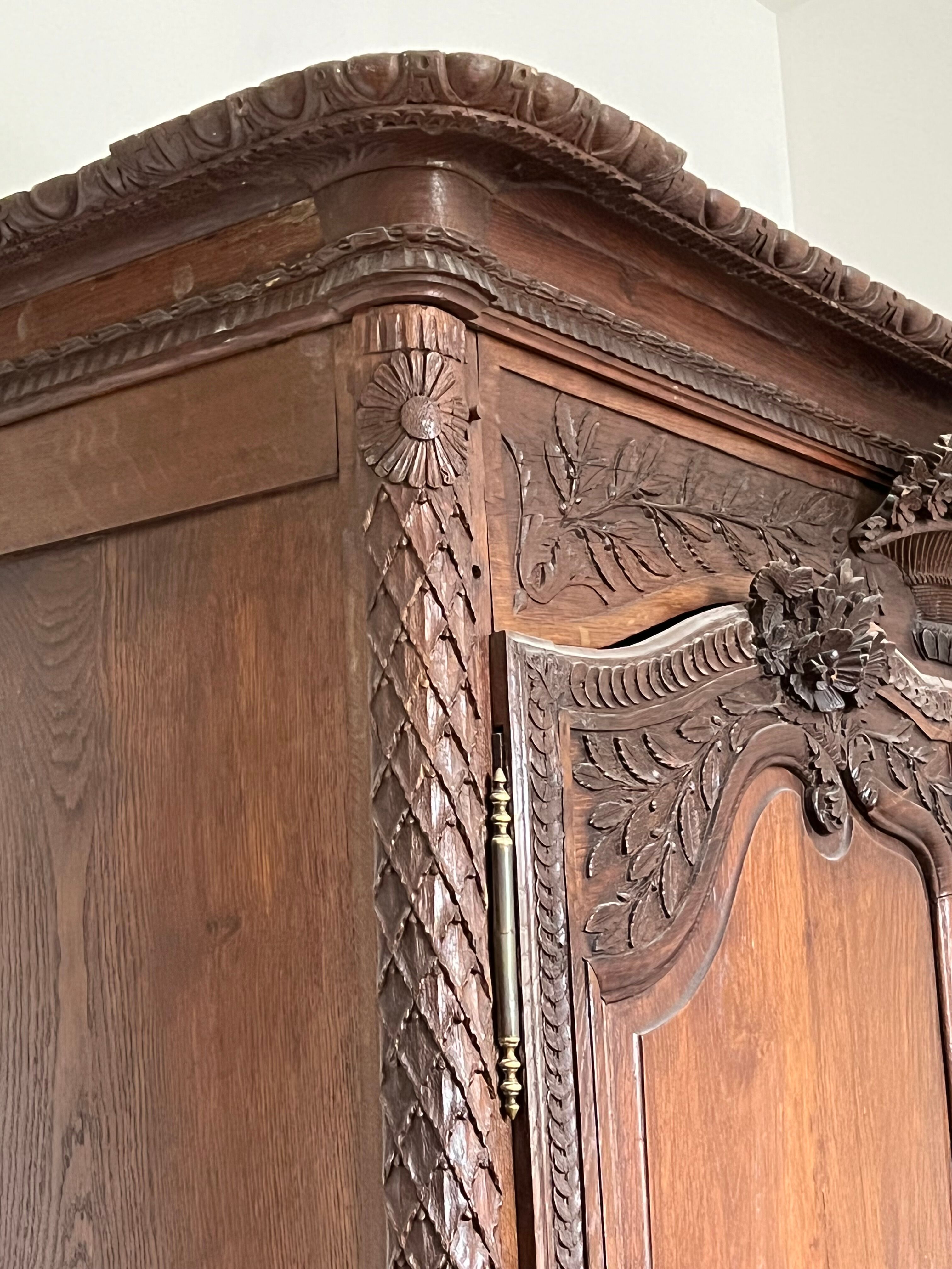 Beautiful and ancient Norman wedding wardrobe, richly carved