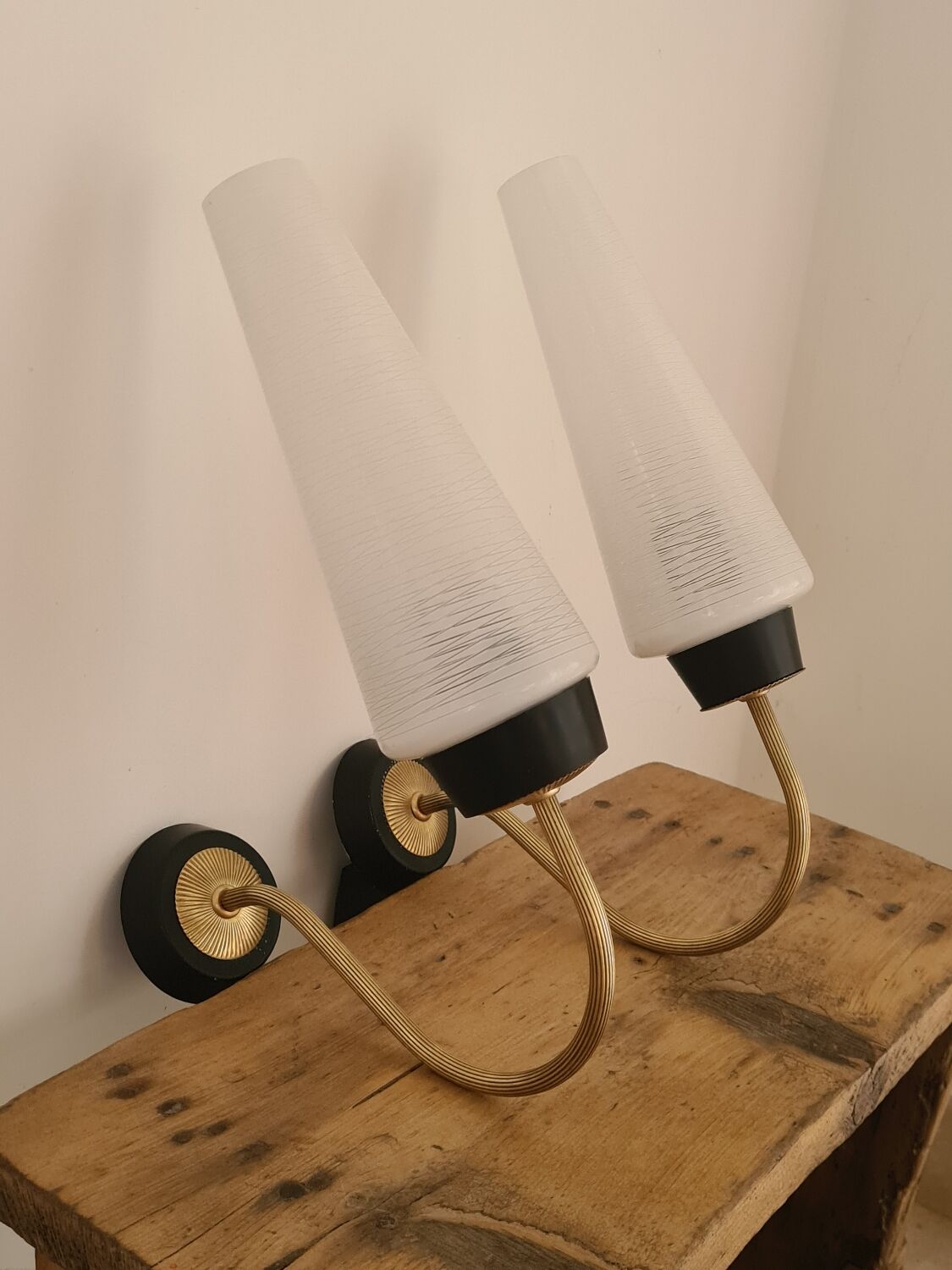 Pair of bobbin wall lights from the 50s and 60s