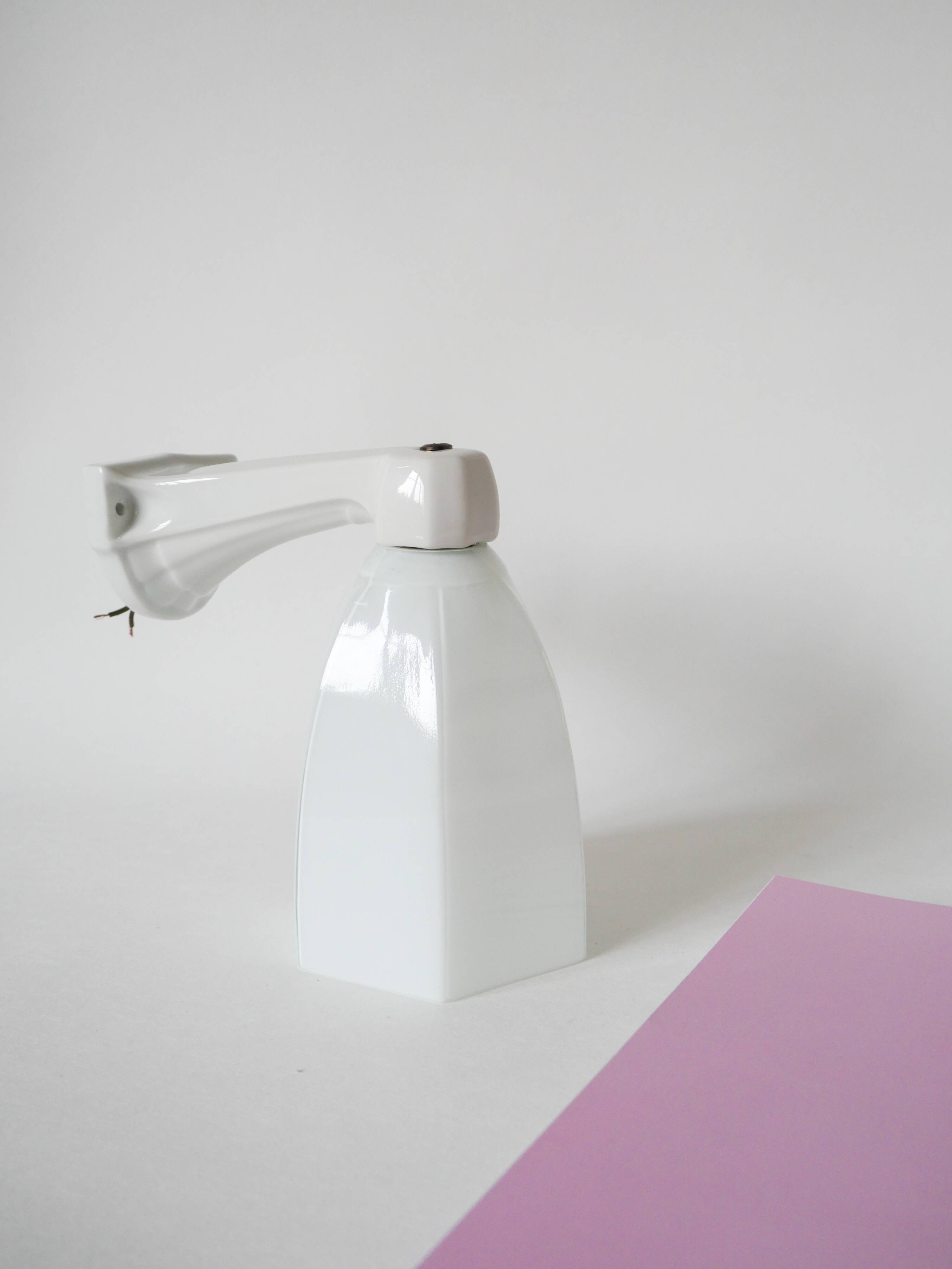 graphic art deco wall light and 20th century porcelain support