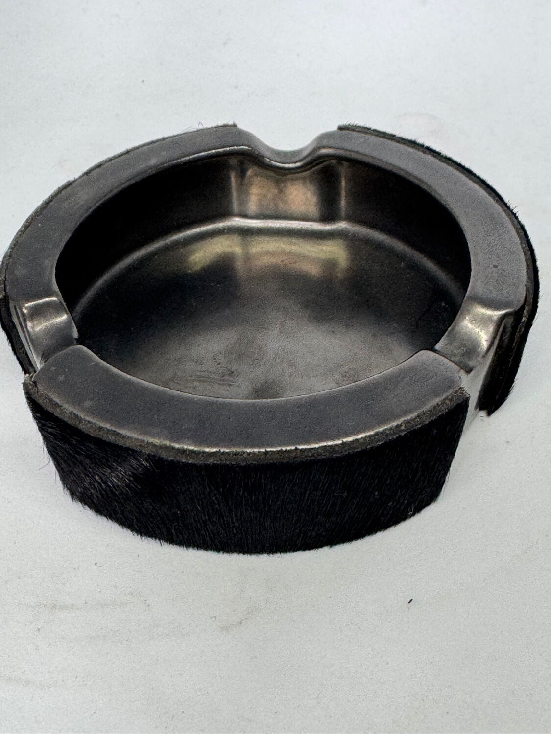 Vintage metal ashtray and hair