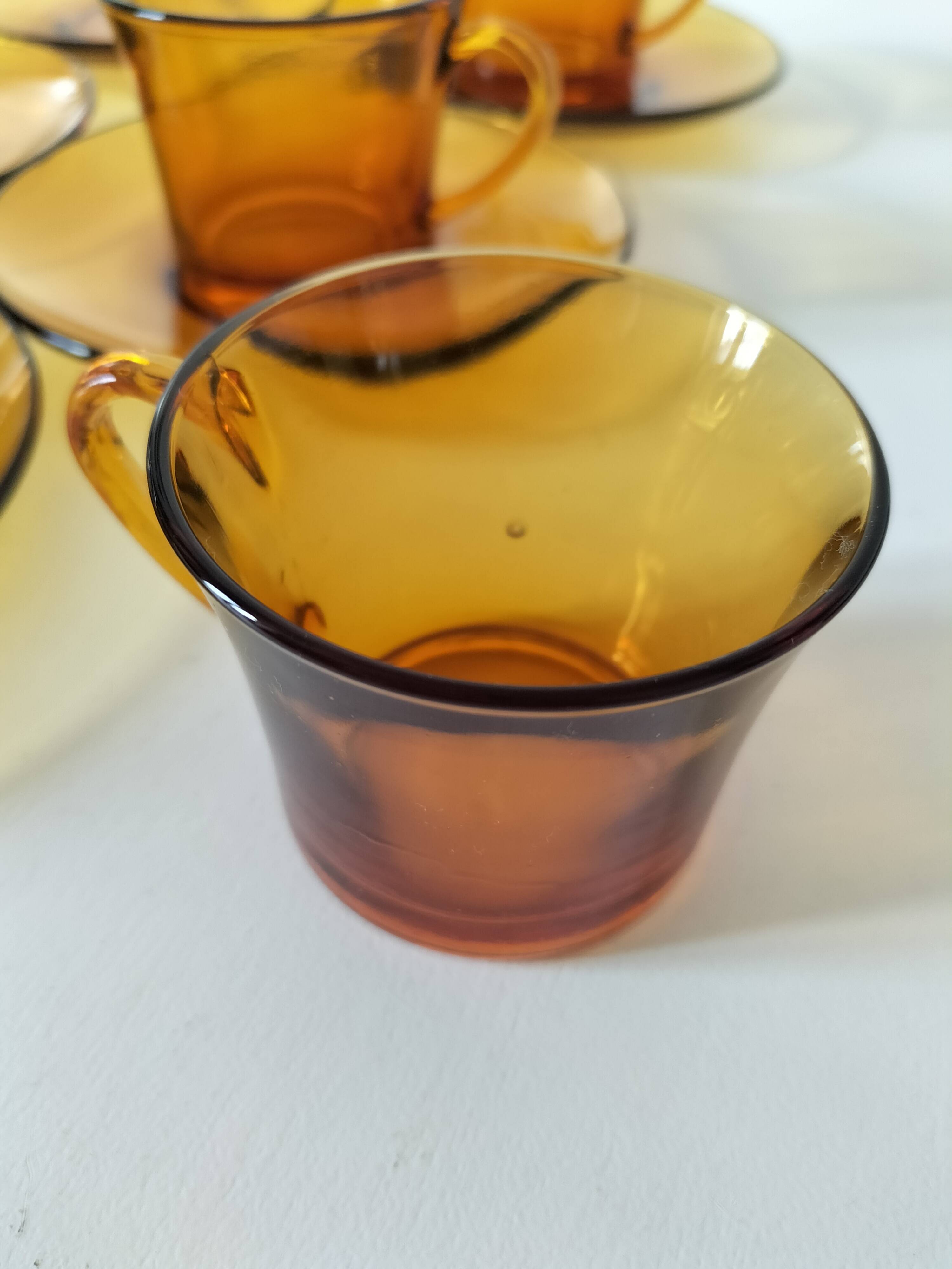 5 vintage amber Duralex cups and saucers