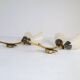 Mid-century pair of wall lamps in brass and opaline attributed to Asea Sweden, 1950s.