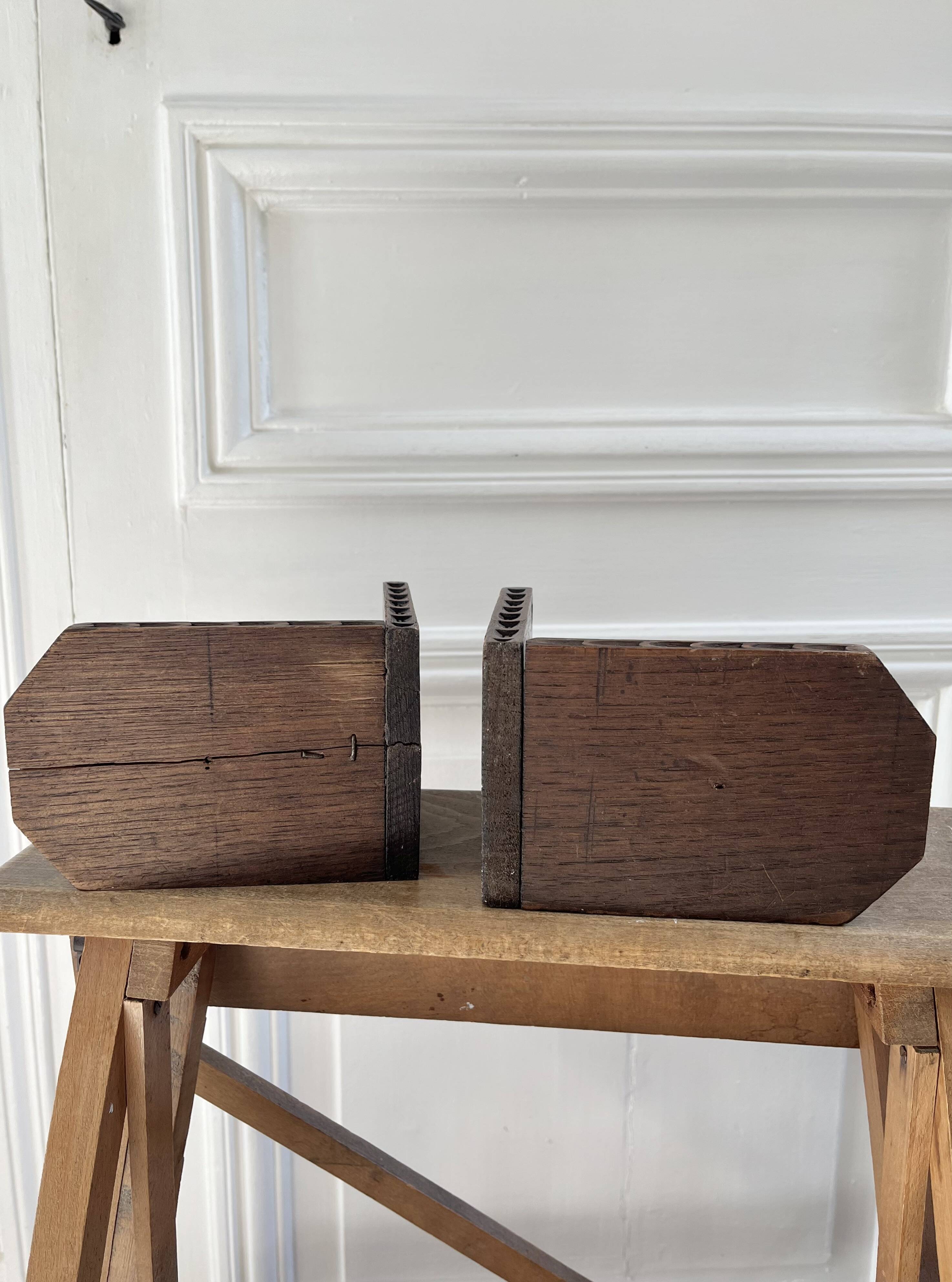 Pair of carved wooden bookends