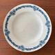 Large deep dish in ironstone Longchamp model Denise vintage blue