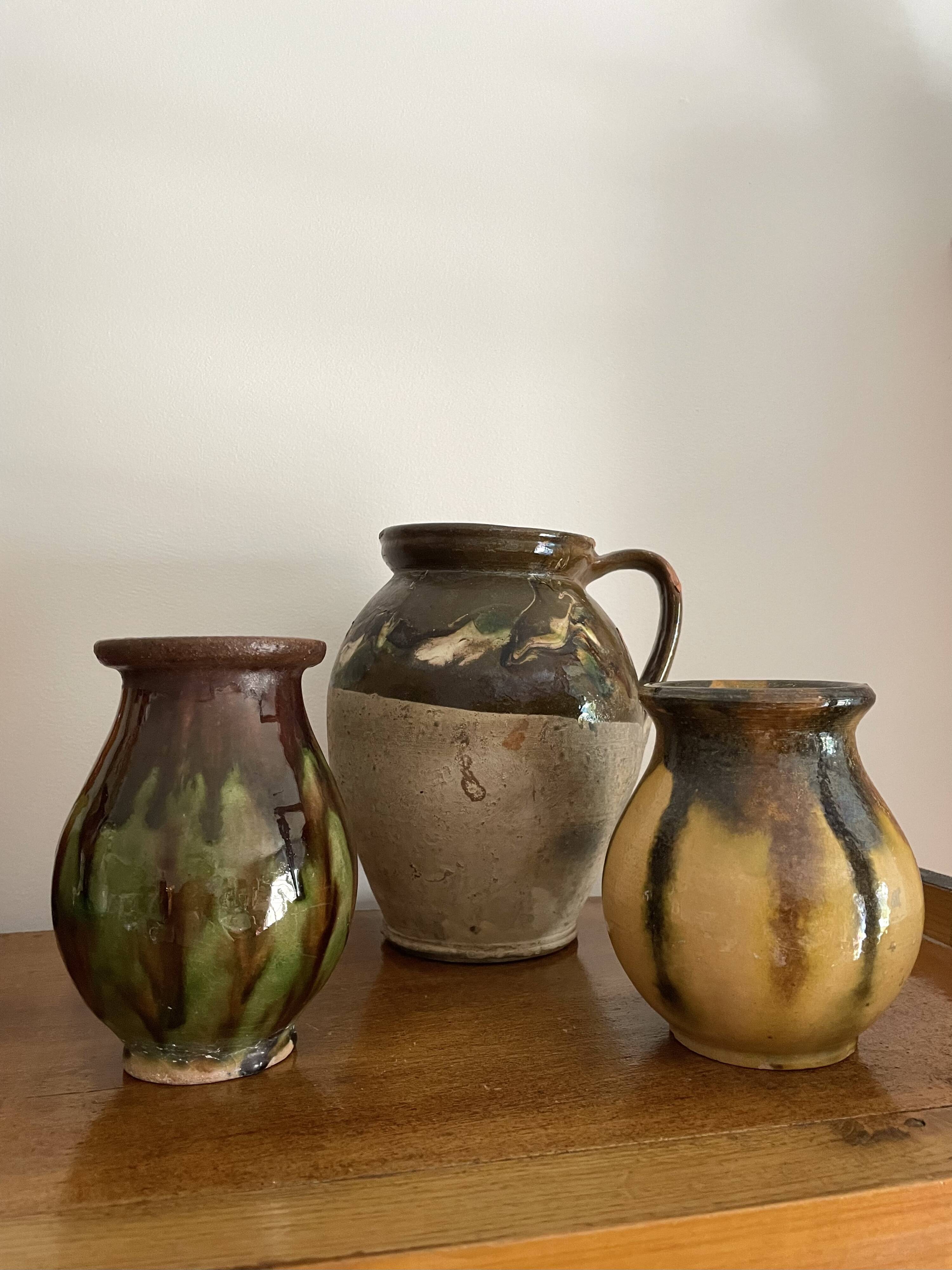 Lot d’une cruche et 2 petits vases