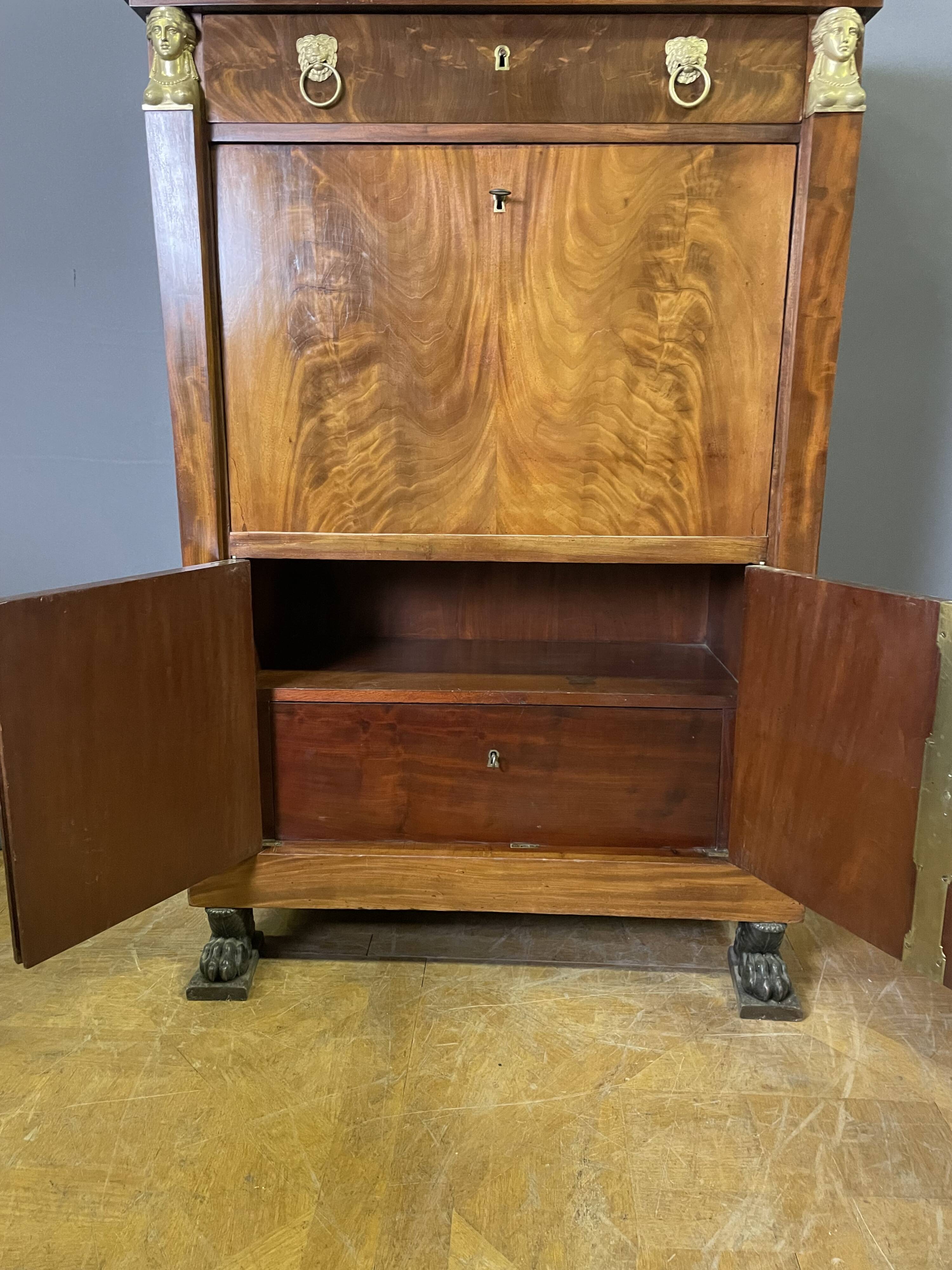 Empire mahogany secretary from the Consulate period.