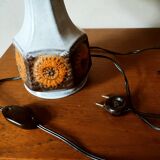Ceramic lamp with sun patterns