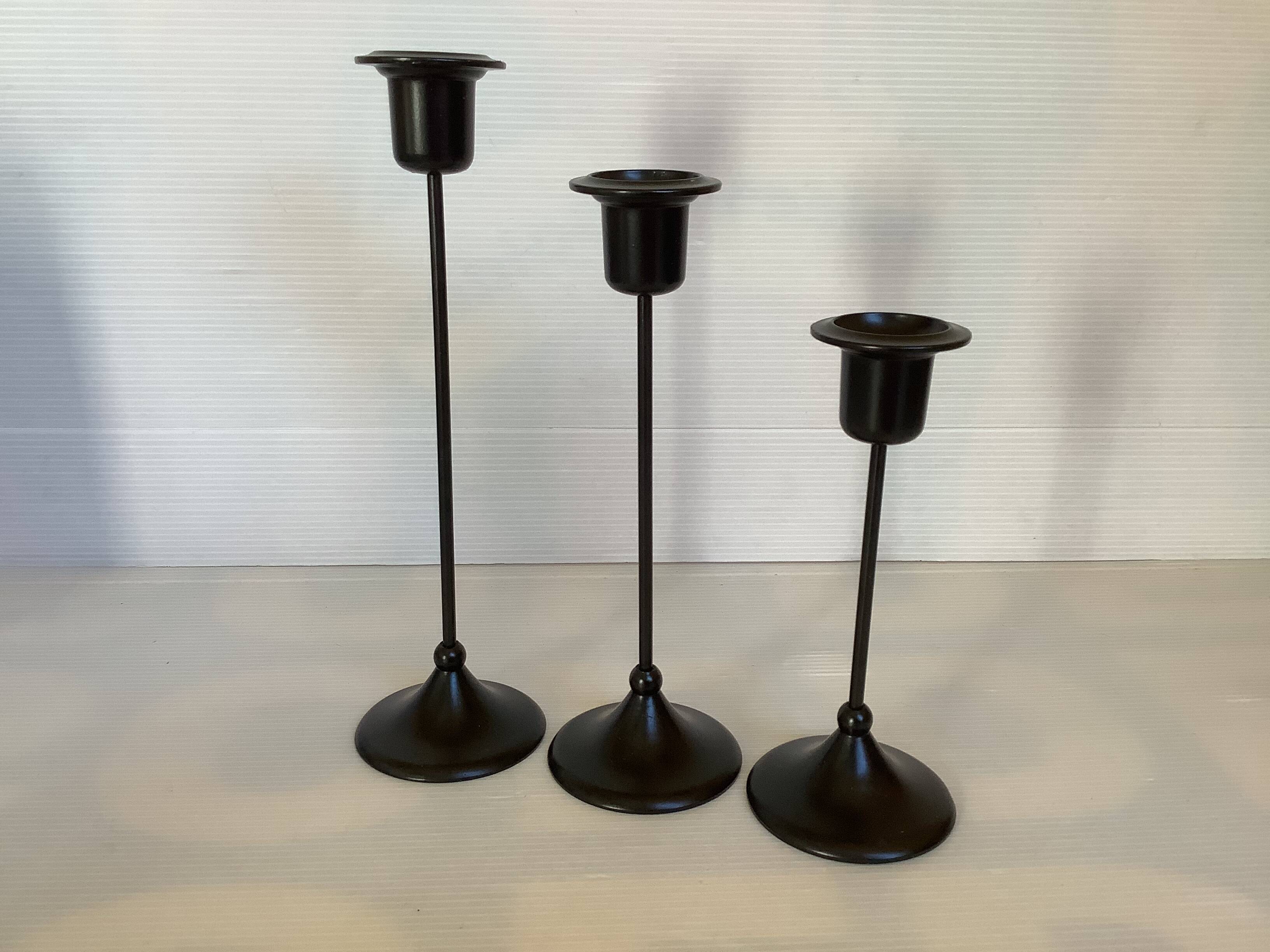 Trio of Scandinavian candlesticks with black tulip base