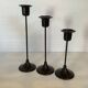 Trio of Scandinavian candlesticks with black tulip base