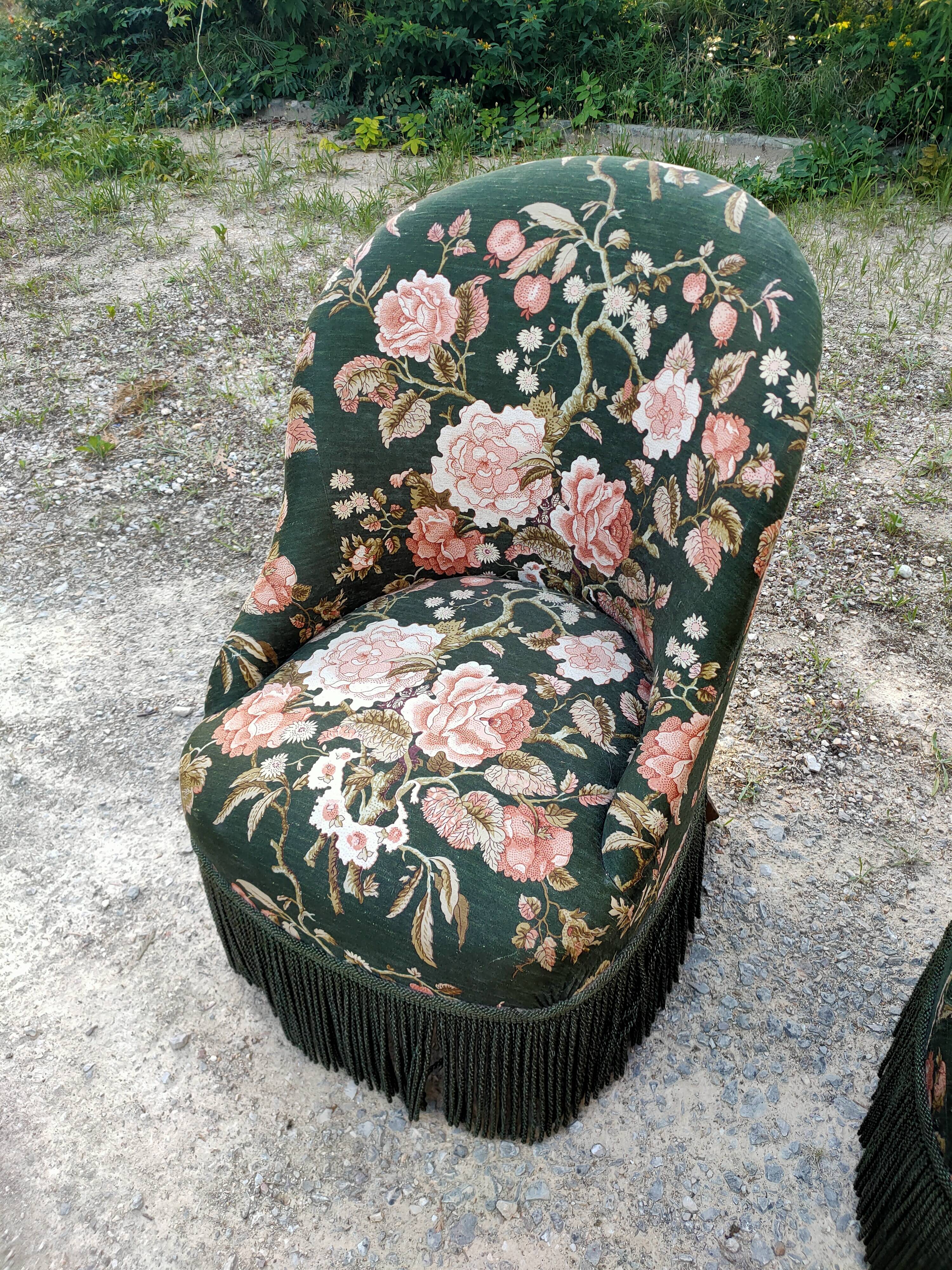 Two toad armchairs, floral motifs