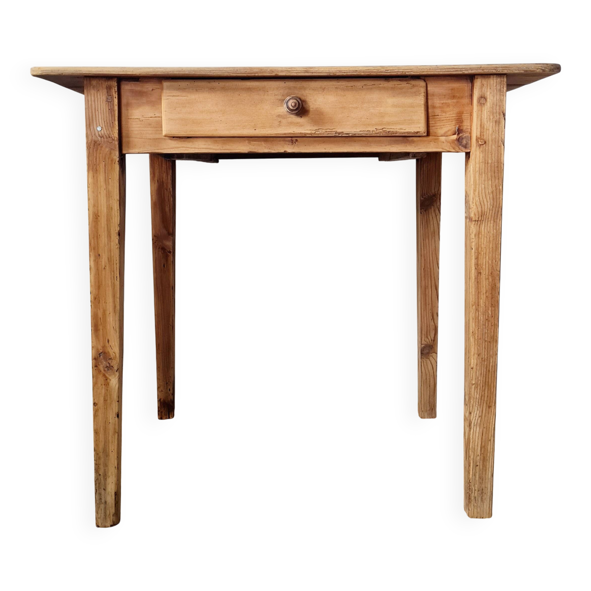 Small old farmhouse table in raw wood.
