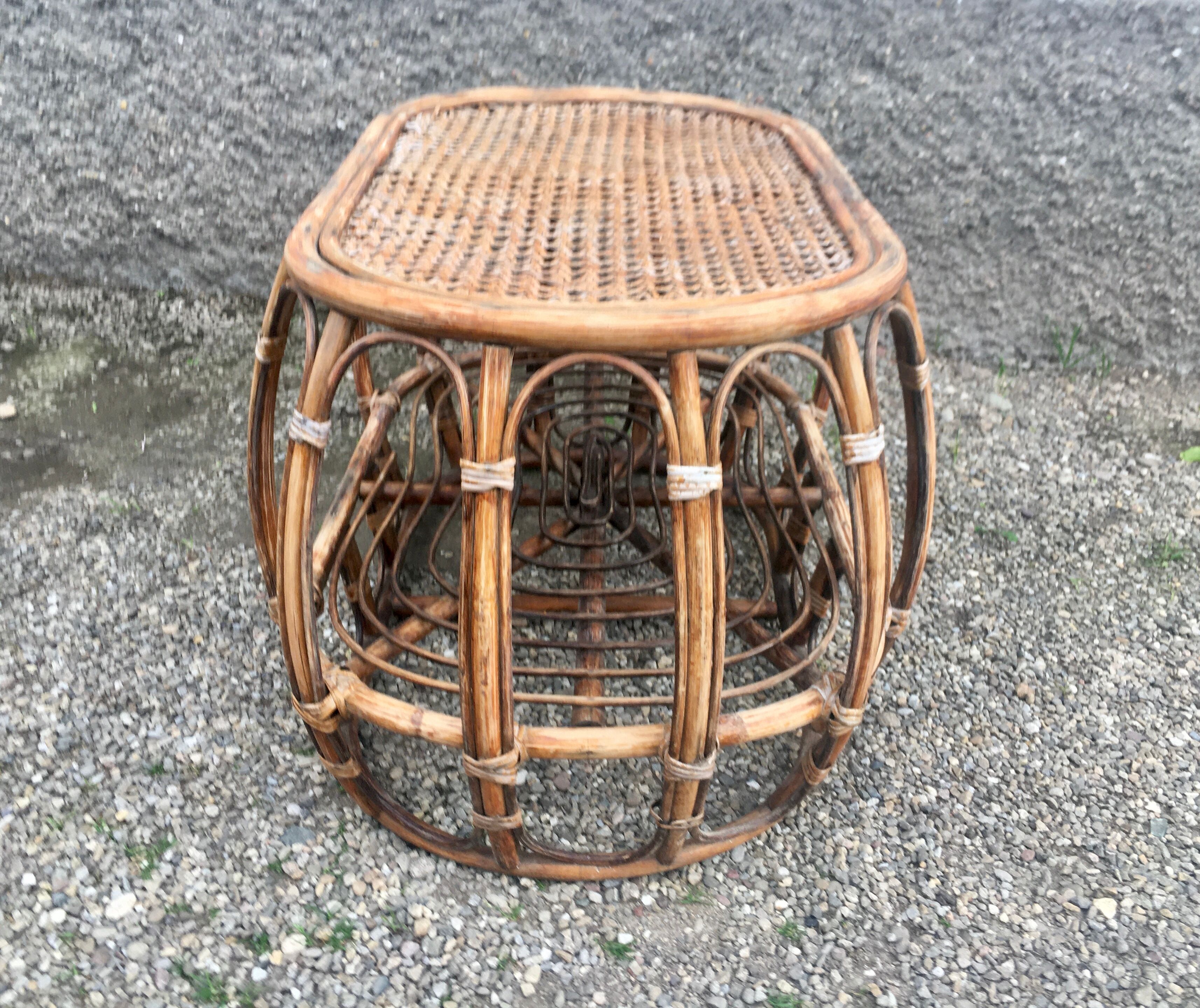Pair of rattan armchairs and vintage oval table