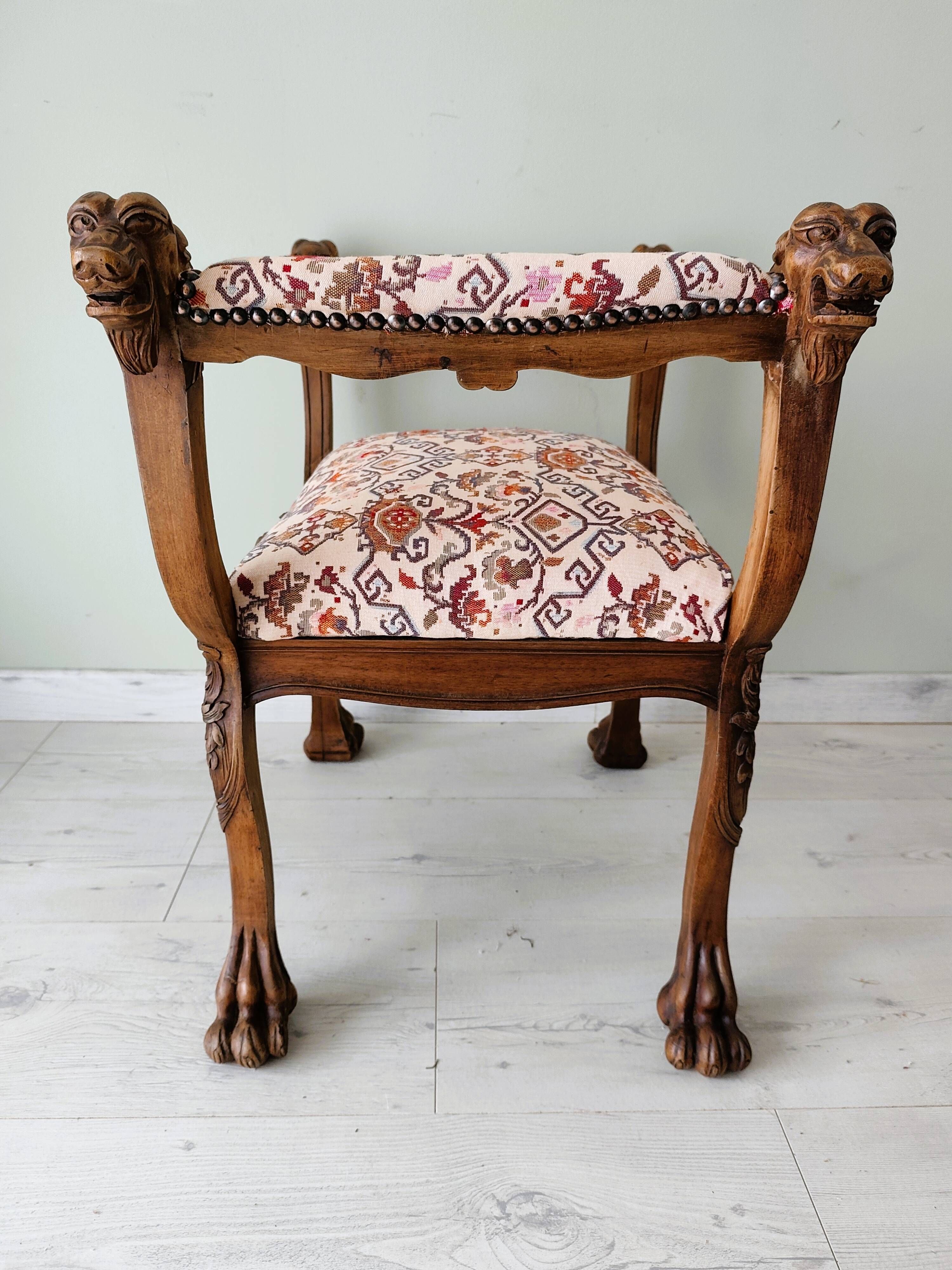 Neo-Renaissance banquette style with lion heads