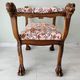Neo-Renaissance banquette style with lion heads