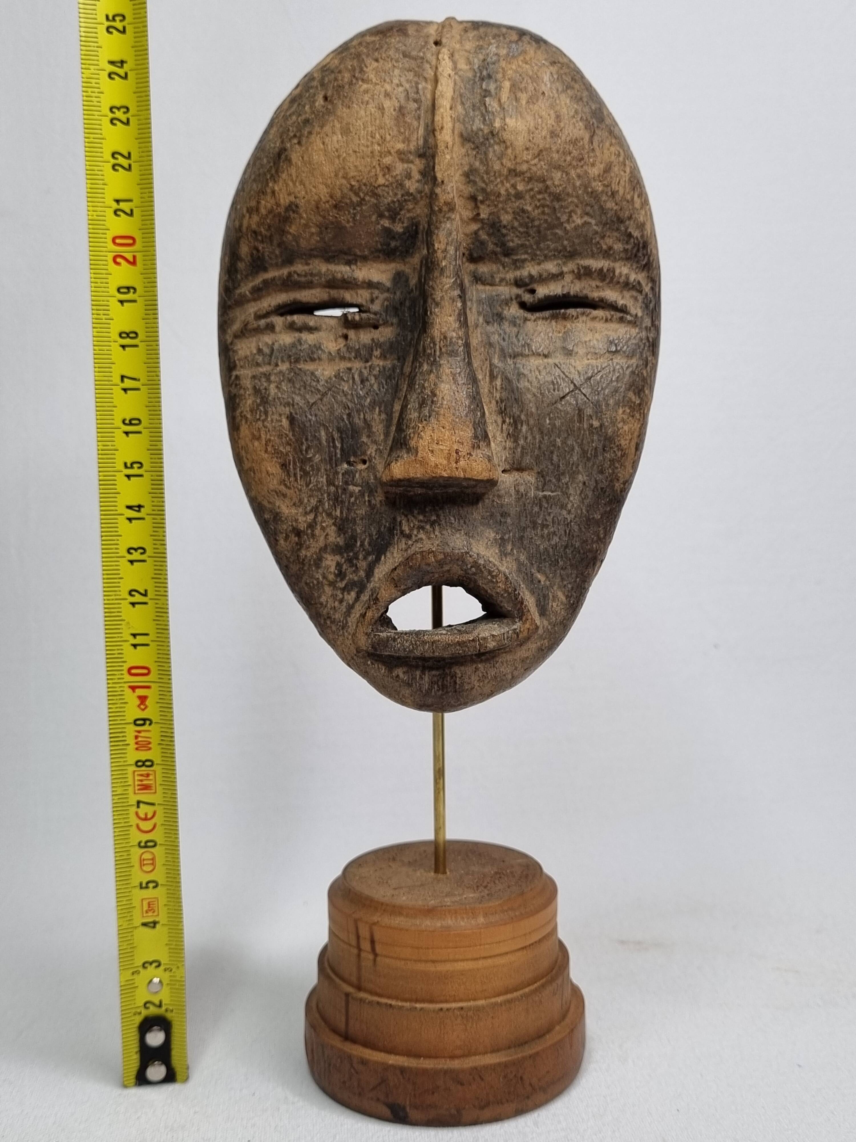Antique Dan passport mask in carved wood 15 cm, with stand