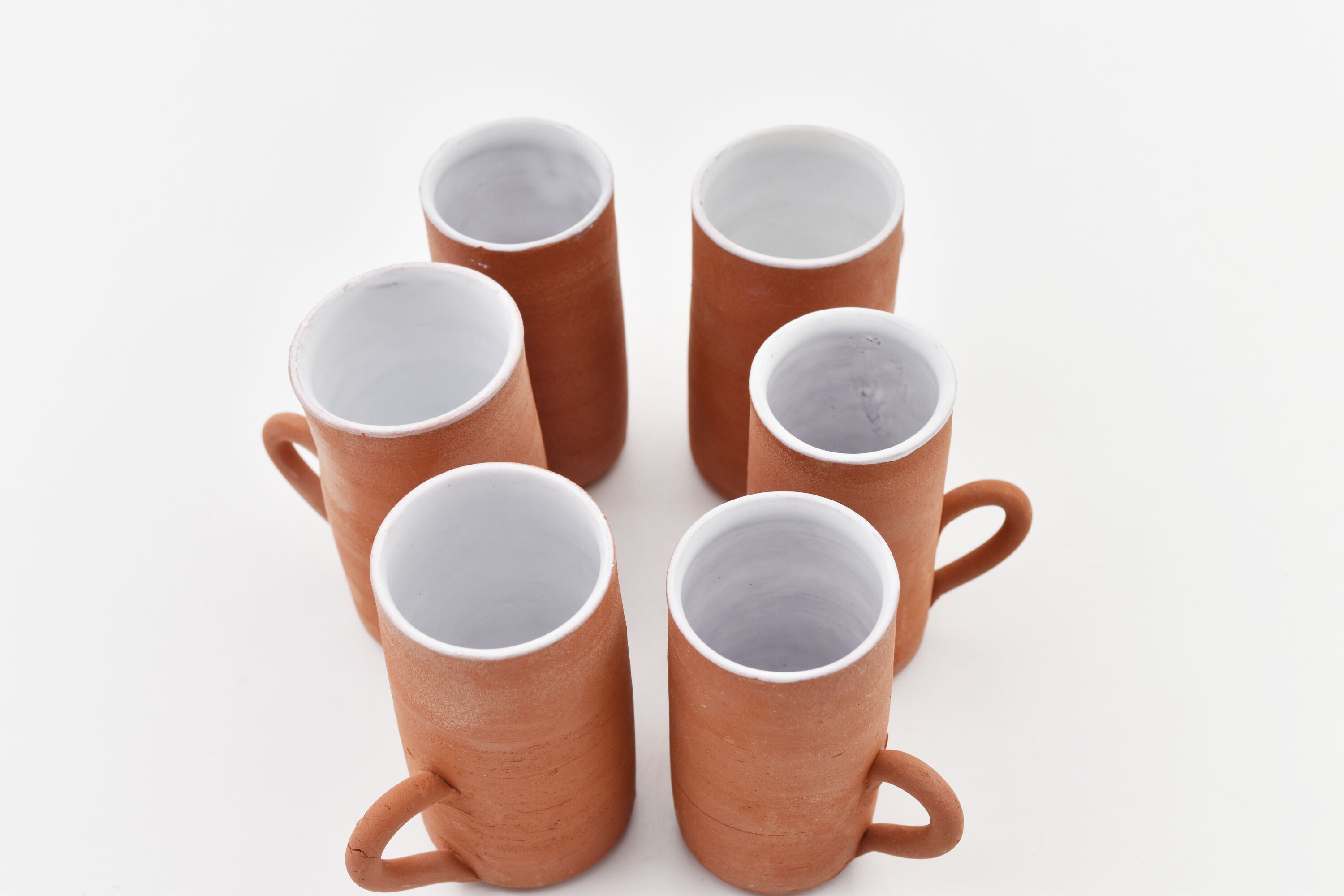Series of six terracotta cups